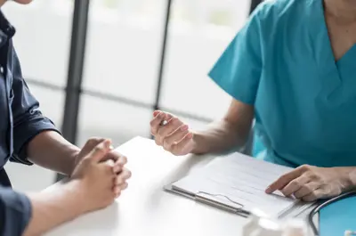 Healthcare Counsel Physician Giving Recommendations to Individual